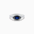 The Royal Bleu 14K White Gold Sapphire and Diamond Ring features a marquise-cut sapphire center, embraced by a halo of sparkling diamonds on a sleek white gold band.