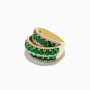 The Limited Edition 14K Yellow Gold Emerald and Diamond Cocktail Ring (7.14 TCW) features three rows of oval emeralds, elegantly bordered and interspersed with sparkling white diamonds, shown on a white background.