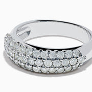 The 14K White Gold 3 Row Pave Diamond Dome Band showcases three closely set rows of pave diamonds, crafted in a sleek dome design and presented on a plain white background.