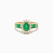 The Brasilica 14K Yellow Gold Emerald and Diamond Ring features an oval emerald center, sparkling diamonds, and elegant green inlays along the band.