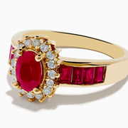 The Ruby Royale 14K Yellow Gold Ruby and Diamond Ring showcases an oval ruby centerpiece, surrounded by white diamonds and accented with rectangular red stones along the band.