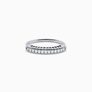 The 14K White Gold Flexible Size 7-10 Diamond Ring features a row of small round diamonds along the top and is displayed on a plain white background.
