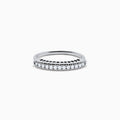 The 14K White Gold Flexible Size 7-10 Diamond Ring features a row of small round diamonds along the top and is displayed on a plain white background.
