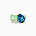 The 14K Yellow Gold Diamond Green Amethyst London Blue Topaz Toi Et Moi Ring showcases a square-cut Green Amethyst and a pear-shaped London Blue Topaz side by side, accented with sparkling Diamonds along the band.
