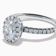 The Lab Grown Oval Diamond Halo and Hidden Halo Ring in 14K White Gold showcases an oval lab grown diamond center, a sparkling diamond halo, hidden halo accents, and additional diamonds along the band.