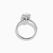 The Lab Grown Pear Diamond Halo and Hidden Halo Ring in 14K White Gold features a lab-grown pear center, a surrounding halo and hidden halo of diamonds on a white gold band, shown against a plain white background.