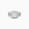 The 14K White Gold Lab Grown Diamond Ring and Band Set features a large round lab grown diamond, surrounded by smaller diamonds on a split shank band encrusted with more diamonds, all shown against a white background.