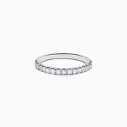 The 14K White Gold Lab Grown Diamond Ring and Band Set features a large round lab grown diamond, surrounded by smaller diamonds on a split shank band encrusted with more diamonds, all shown against a white background.