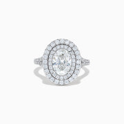 The Lab Grown Oval Diamond Double Halo Ring in 14K White Gold features a dazzling oval center, lab grown diamonds in a double halo, and extra sparkle along the band for an elegant look.
