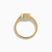 The Lab Grown Diamond East West Oval Ring in 14K Yellow Gold showcases a single lab diamond in a sleek bezel setting, presented against a plain white background.