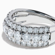 The Lab Grown Round Diamond Wide Band in 14K White Gold features three rows of round-cut diamonds, with a slightly larger center row, displayed on a plain white background.