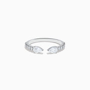 The Lab Grown Diamond Open Shank Pear Band in 14K white gold features two pear-shaped diamonds at each end and small round stones along the band.