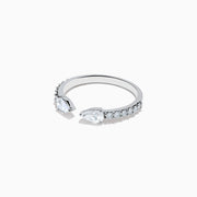 The Lab Grown Diamond Open Shank Pear Band in 14K white gold features two pear-shaped diamonds at each end and small round stones along the band.