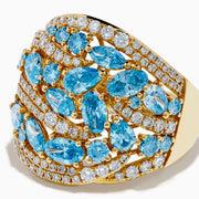Make a statement with our Lab Grown Blue and White Diamond Statement Ring in 14K Yellow Gold, featuring marquise-cut blue stones and rows of lab-grown diamonds in an elegant wavy design.