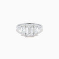 The Lab Grown Emerald Cut Diamond 3 Stone Ring in 14K White Gold features a central emerald-cut lab-grown diamond flanked by two rectangular diamonds on each side.