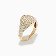 The Lab Grown Diamond Oval Pave Signet Pinky Ring in 14K yellow gold features a lustrous oval top and a band adorned with rows of sparkling lab grown diamonds, showcased on a white background.