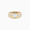 The Lab Grown Diamond Channel-Set Men's Pinky Ring in 14K Yellow Gold showcases a prominent round lab-grown diamond center and a channel-set row of square diamonds, displayed on a plain white background.