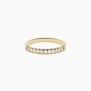The DOro 14K Yellow Gold Diamond Band 0.24 TCW showcases a row of small, round white diamonds set into the gold band, displayed on a plain white background.