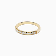 The DOro 14K Yellow Gold Diamond Band 0.24 TCW showcases a row of small, round white diamonds set into the gold band, displayed on a plain white background.