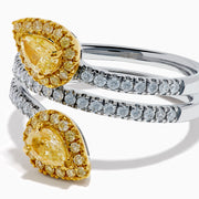 The 18K Two-Tone Gold Yellow and White Diamond Wrap Bypass Ring features pear-shaped diamond clusters haloed by smaller diamonds on a split gold band sparkling with round white diamonds.