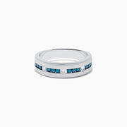 The Mens 14K White Gold Blue and White Diamond Band Ring features a row of blue and white diamonds, with four round white gemstones set into the band, shown on a plain white background.