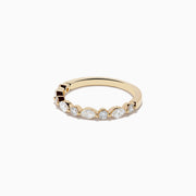 The Doro 14K Yellow Gold Diamond Ring by Effy features a series of oval and round diamonds set along the band, beautifully displayed against a plain white background.