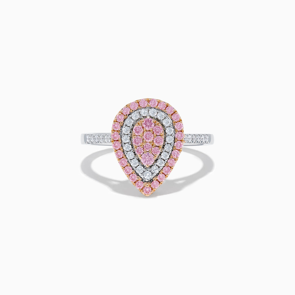 The 14K Two Tone Pink and White Diamond Ring features a teardrop shape with concentric rows of pink and white diamonds on a silver band, highlighted by a central cluster of pink stones.