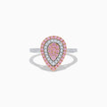 The 14K Two Tone Pink and White Diamond Ring features a teardrop shape with concentric rows of pink and white diamonds on a silver band, highlighted by a central cluster of pink stones.