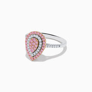 The 14K Two Tone Pink and White Diamond Ring features a teardrop shape with concentric rows of pink and white diamonds on a silver band, highlighted by a central cluster of pink stones.