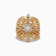 The Doro 14K Yellow Gold Diamond Statement Ring showcases intricate filigree patterns, multiple small diamonds, and a large central diamond, all set in a wide, ornate yellow gold band with decorative loops and arches.