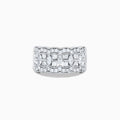 Experience timeless elegance with the 14K White Gold Diamond Multi Shape Wide Band Ring, showcasing two rows of brilliant round diamonds that border a central row of rectangular baguette-cut diamonds arranged in an intricate, repeating pattern.