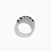 Experience timeless elegance with the 14K White Gold Diamond Multi Shape Wide Band Ring, showcasing two rows of brilliant round diamonds that border a central row of rectangular baguette-cut diamonds arranged in an intricate, repeating pattern.
