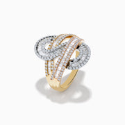 The Trio 14K Tri Color Gold Diamond Swirl Ring features an intricate swirl design in three gold tones, accented with rows of small rectangular diamonds, shown against a white background.