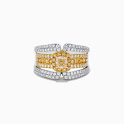 The 14K Two Tone Gold Yellow Diamond Statement Ring 1.71 TCW showcases a central yellow diamond surrounded by white and yellow diamonds on a wide, split-band design.