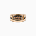 The Mens 14K Rose Gold Espresso and White Diamond Ring features a rectangular setting with two rows of espresso diamonds, accented by smaller white diamonds and brown stones along each side.
