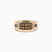 The Mens 14K Rose Gold Espresso and White Diamond Ring features a rectangular setting with two rows of espresso diamonds, accented by smaller white diamonds and brown stones along each side.