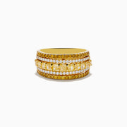 The Canare 18K Yellow Gold Yellow Diamond Band Ring features alternating rows of sparkling yellow and white gemstones set around the band.