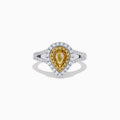 The Canare 18K Two-Tone Gold Pear Shaped Double Halo Yellow Diamond Ring features a yellow diamond with a double halo of white diamonds, set in an 18K gold band and displayed on a white background.