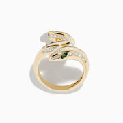 The Safari 14K Yellow Gold Emerald and Diamond Snake Ring features baguette-cut diamonds along its body and two emerald gemstones for eyes, shown on a white background.