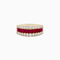 The Ruby Royale 14K Yellow Gold Princess Cut Ruby & Diamond Band features two rows of round white diamonds and a central row of princess-cut rubies, elegantly set on a white background.
