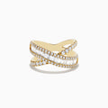 The DOro 14K Yellow Gold Diamond Criss Cross Ring 1.14 TCW showcases two intertwining bands—one set with round diamonds, the other with baguette diamonds—elegantly presented on a white background.