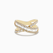 The DOro 14K Yellow Gold Diamond Criss Cross Ring 1.14 TCW showcases two intertwining bands—one set with round diamonds, the other with baguette diamonds—elegantly presented on a white background.