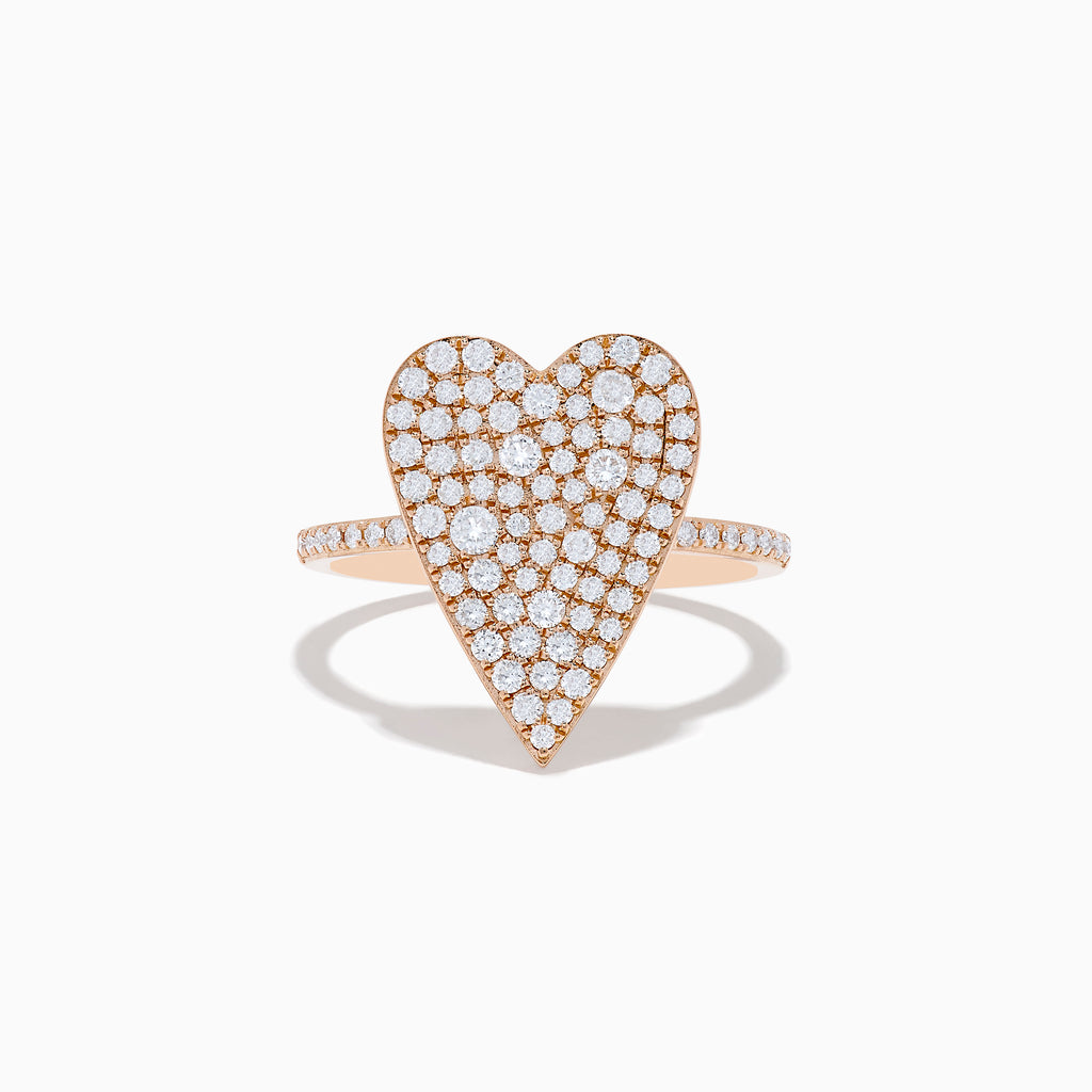 The Pave Rose 14K Rose Gold Diamond Heart Ring features a large diamond-encrusted heart centerpiece with additional diamonds along the band, shown on a white background.