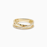 The 14K Yellow Gold Diamond Studded Crossover Ring features three intertwined yellow gold bands, with one pavé set with sparkling white diamonds, shown against a white background.