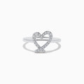 The Novelty 14K White Gold Heart Ring features an open-heart design adorned with sparkling diamonds, shown against a plain white background.