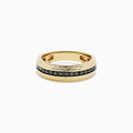 The Men's 14K Yellow Gold Black Diamond Textured Ring features a ridged, textured band and a central row of black diamonds—a bold statement piece for men.