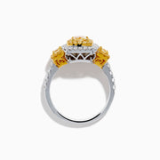 The Canare 18K Two Tone Gold White and Yellow Diamond Ring features a large rectangular yellow diamond center, encircled by rows of yellow and white diamonds, with side yellow diamonds bordered by sparkling white stones.