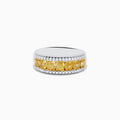 The Canare 18K Two Tone Gold White and Yellow Diamond Band Ring features a central row of yellow diamonds bordered by two rows of white diamonds, beautifully displayed on a white background.