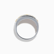 The Canare 18K Two Tone Gold White and Yellow Diamond Band Ring features a central row of yellow diamonds bordered by two rows of white diamonds, beautifully displayed on a white background.