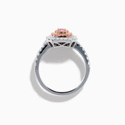The 18K Two Tone Gold White and Pink Diamond Ring showcases a square pink diamond center, double rows of pink diamonds, an outer border of round white diamonds, and additional diamonds set along the band.